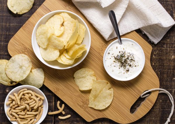 top-view-potato-chips-with-sauce-min-scaled.jpg